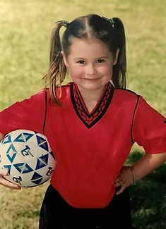 Young child in a soccer uniform, the family inspiration behind Diabetech
