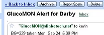 GlucoMON alert showing a blood glucose reading